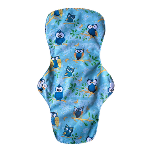 Reusable sanitary pad with owl pattern on a blue background