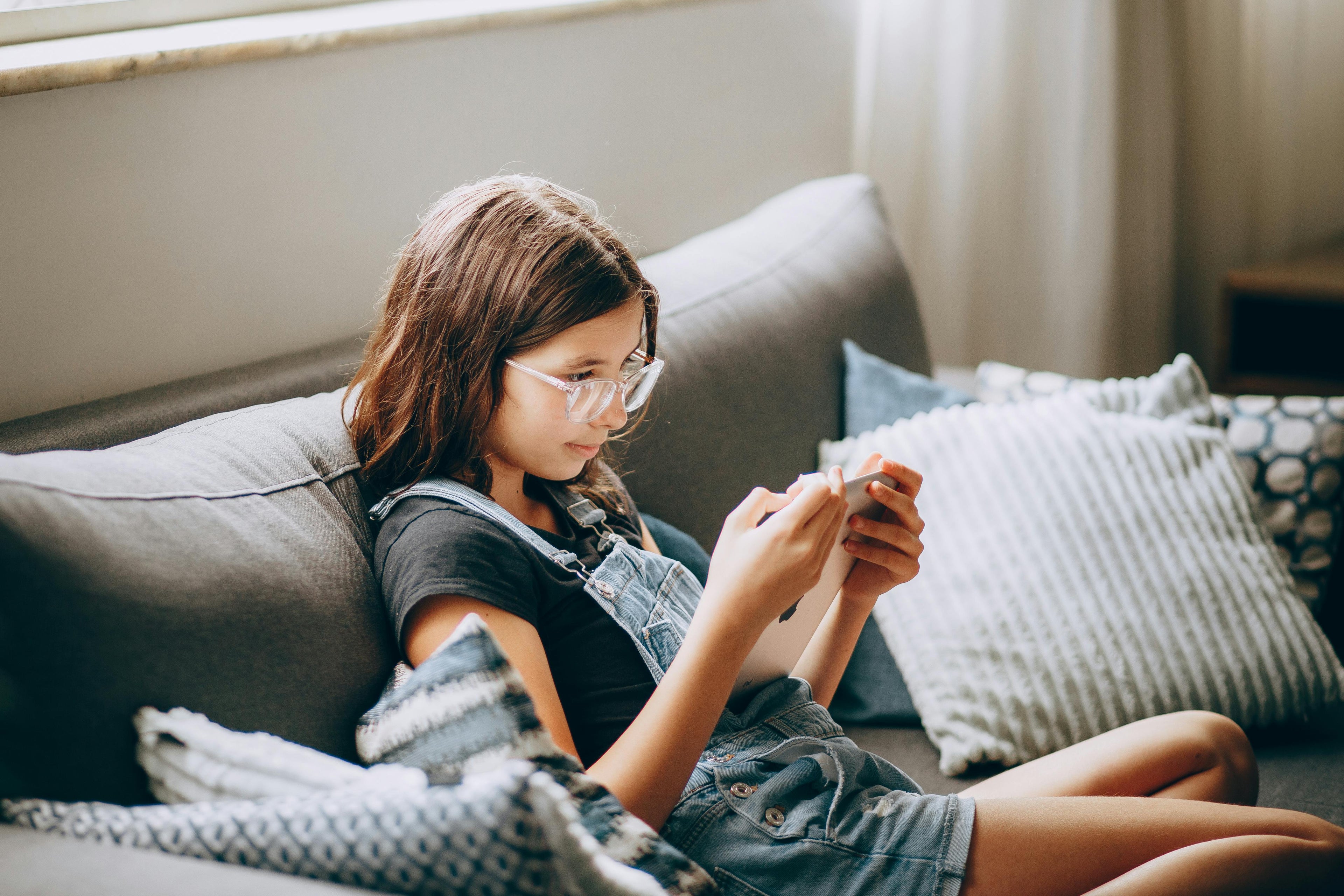 Teenage girl learning to track her menstrual cycle for hormonal health and body literacy