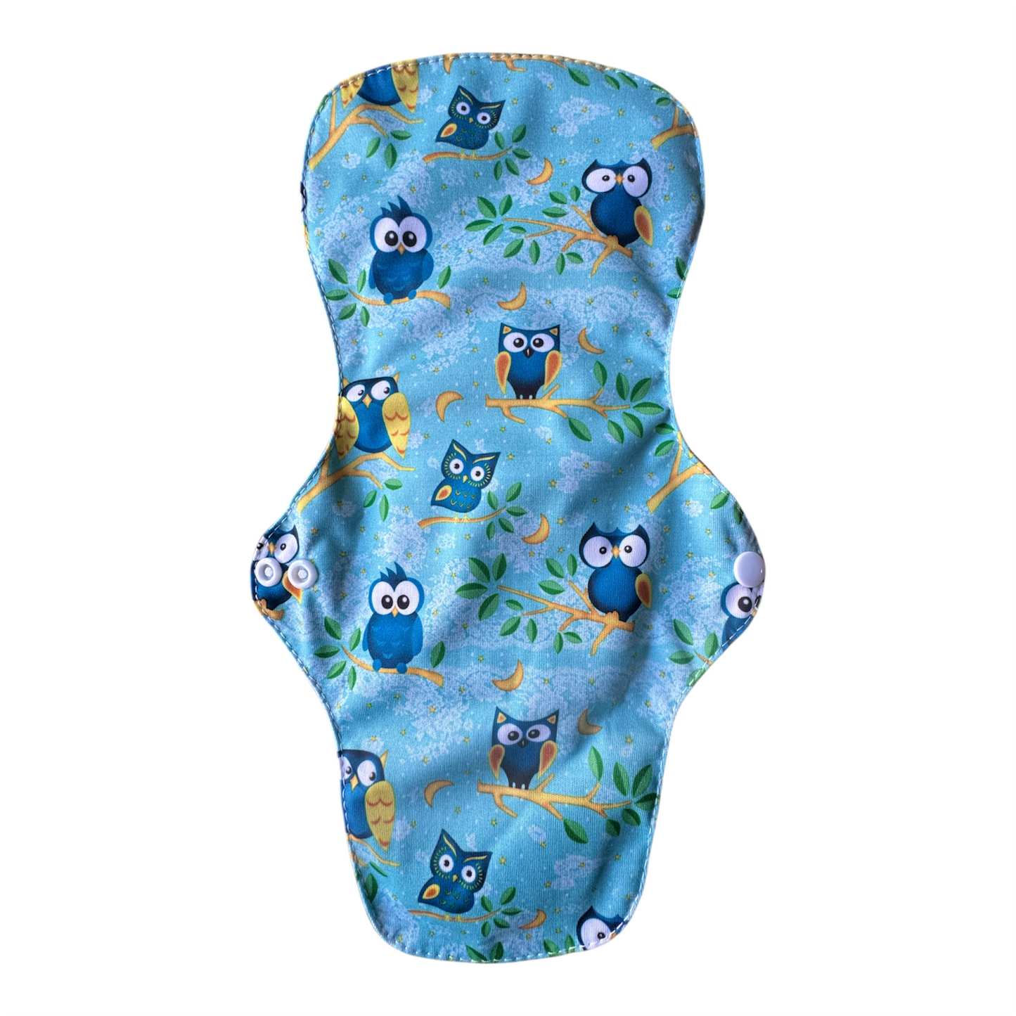 Reusable sanitary pad with owl pattern on a blue background