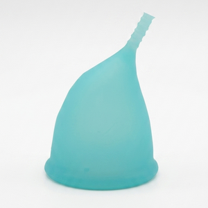 Turquoise menstrual cup on a white background